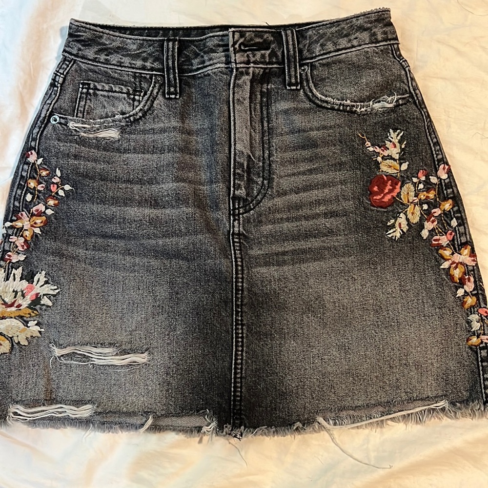 Embroidered acid wash denim skirt